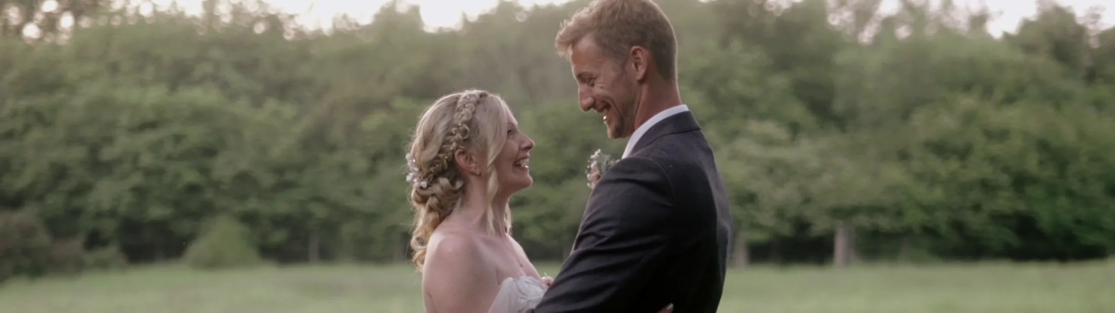 A couple smiling together in an E-Motions wedding film